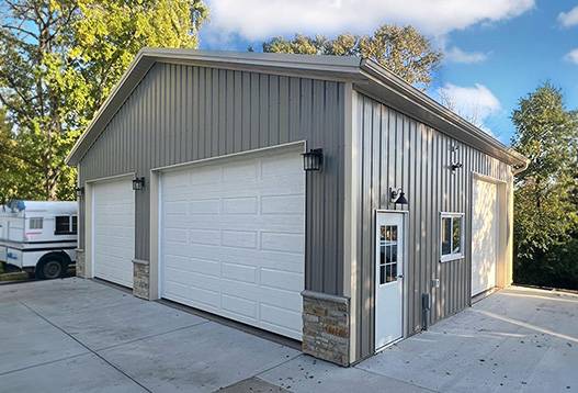 Tan Garage Completed by Everlast Structures